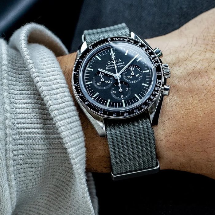 A woven nylon WIS watch strap on an Omega Speedmaster