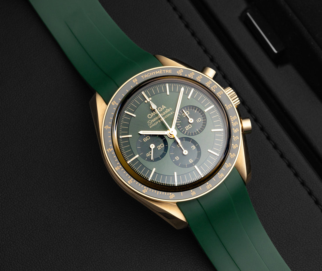 Gold Omega Speedmaster on Green Rubber Integrated Watch Strap | WIS Watch Straps