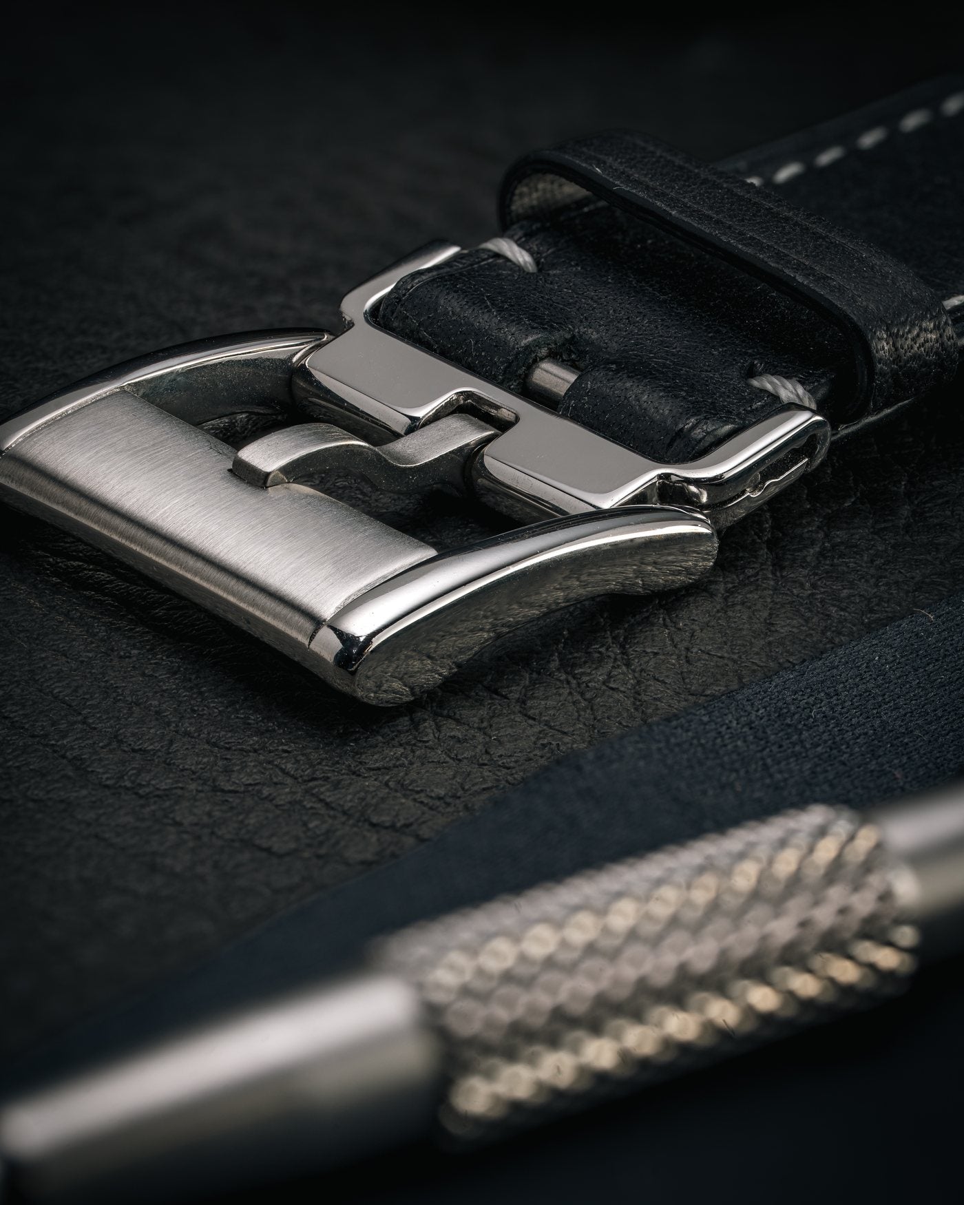 Fitwell M4 link fitted to a pin buckle on a black leather strap