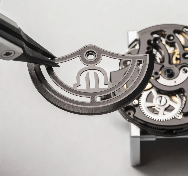 Hand-assembling a Maurice Lacroix movement rotor at the manufacture
